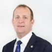 Photo of John  Schuman