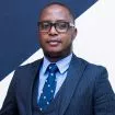 Photo of John  Maina